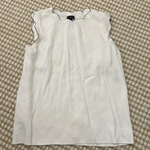 White sweater tank with black lining